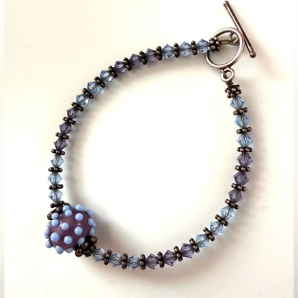 Handcrafted Purple and Blue Beaded Bracelet with Silver Accents